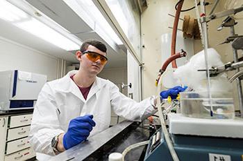 Chemical engineering student working in a lab