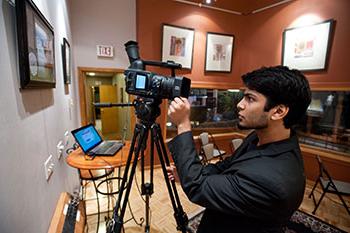 A digital media studies major working at his internship